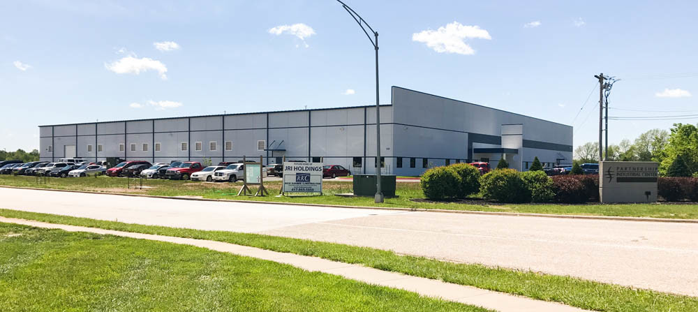 JRI Holdings Inc. occupies its new $5.6 million, 60,000-square-foot office and factory at 1435 N. Alliance Ave.