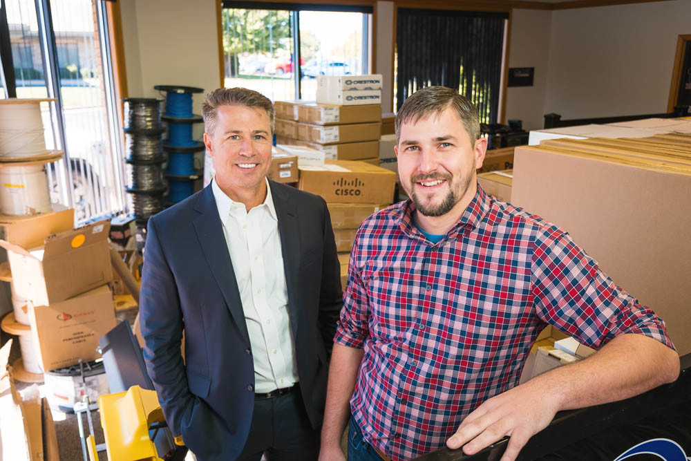 TECH ON THE MOVE: Doug Pitt, left, and Kevin Waterland of Pitt Technology Group are packing up to move from West Sunshine Street.