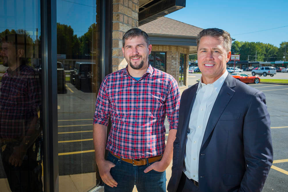 Kevin Waterland, left, and Doug Pitt run Pitt Technology Group after buying back ServiceWorld Computer Center.