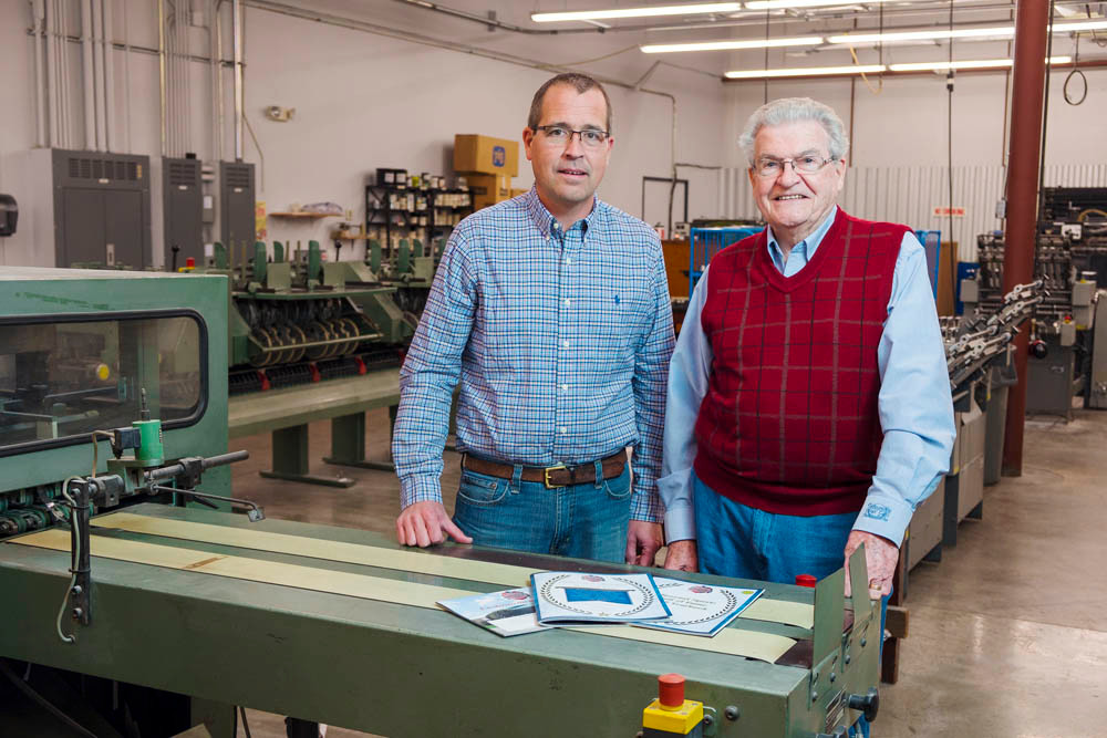 ALL IN: The Hemingway family, led by Wally, right, and Jason, have run Independent Printing for nearly 50 years.