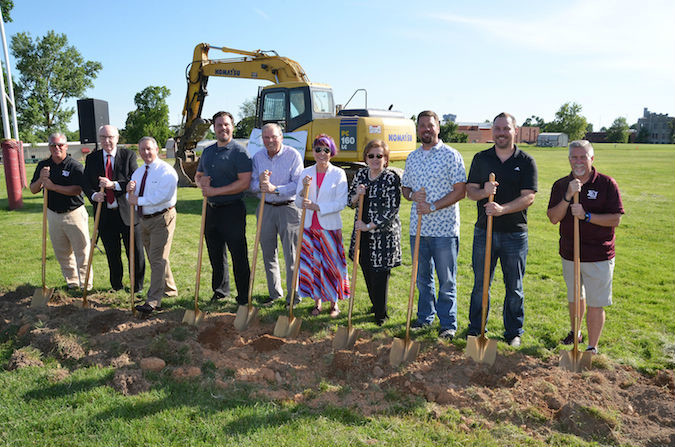 Officials break ground on Evangel University’s turf field. Pictured are Chuck Hepola, left, head football coach; George Wood, chairman of the board; Dennis McDonald, athletic director; Dan Coryell; Sam and Carol Coryell; Evangel President Carol Taylor; Sam M. Coryell; David Coryell; and Bruce Deaton, director of soccer operations at Evangel.