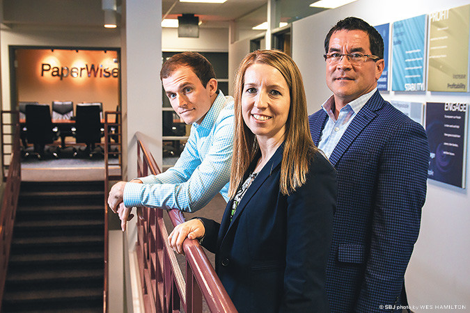 PaperWise Inc. executives Hunter Abbey, left, Heather Woody and Dan Langhofer expect the software and data managed-services company to grow revenue 25 percent this year.