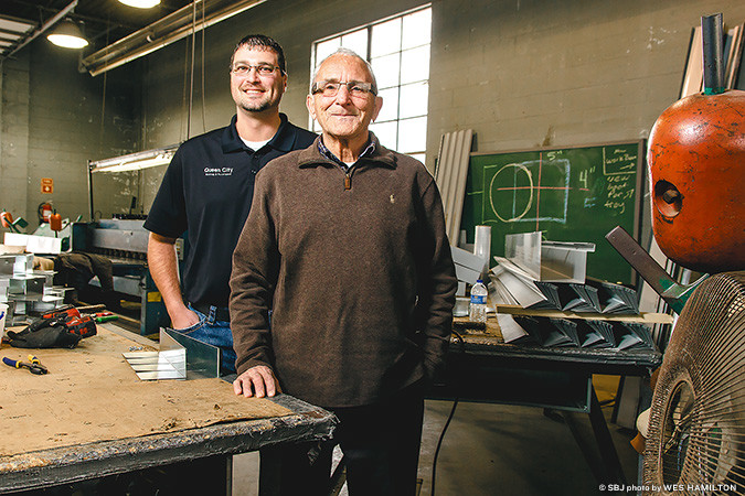 General Manager Michael Katrosh, left, and owner Larry Stock are leading QCR’s upward revenue trend that totaled $8 million last year.