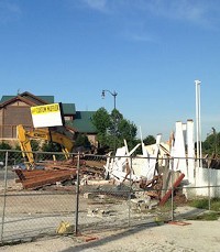Crews have demolished Bud&rsquo;s Custom Muffler Shop, the future home of a Chick-fil-A.SBJ photo by ERIC OLSON