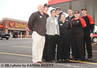 Love's General Manager Charley Fisher, far left, runs the Strafford travel stop with nearly 60 employees.