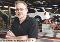 Shop owner Keith Neal worked his way to the top, first starting out sweeping floors at the auto company in high school.