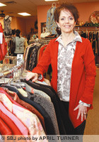 Glenda Green, co-owner of resale clothing boutique The Review Shoppe, says store sales are up 15 percent.