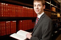 Kendall Seal, attorney with Legal Services of Southern Missouri, earns much of his continuing legal education through monthly Springifield Metropolitan Bar Association lunches. Lawyers must earn 15 hours of CLE a year, and only six can be via self-study.