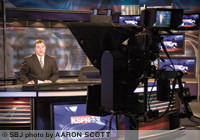 Morning news show anchor Kyle Bosch rehearses prior to the launch of KSPR's high-definition newscast. The HD camera in the studio, along with graphics, are fully automated, operated remotely by a single director.