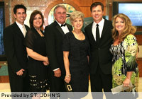 The Pitt family – from left, Rob and Julie Neal, William and Jane Pitt, and Doug and Lisa Pitt – gather together at the St. John's 'Celebration of Imagination' event Saturday. The Pitt children, which also include Brad Pitt and family, donated $1 million for the new Jane Pitt Pediatric Cancer Center.