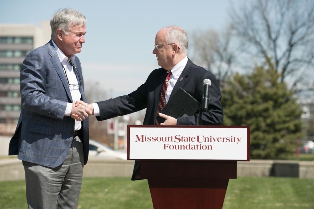 NAMING RIGHTS
Missouri State University’s health and wellness center is renamed after the Bill and Lucille Magers. The name change is in honor of an undisclosed donation from the Magers’ two sons, Bryan and Randy Magers. Above, MSU President Clif Smart, right, thanks Randy Magers.