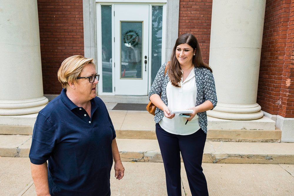 SBJ Features Editor Christine Temple, right, shadows Beth Domann outside the McDaniel School.