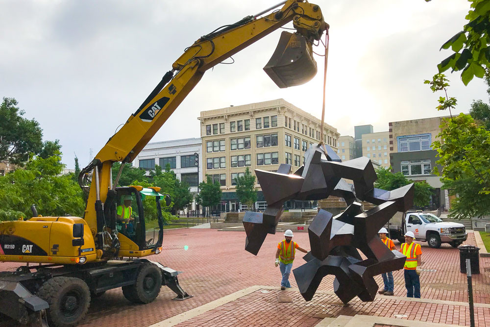 A Springfield Public Works crew rotates the Tumbler on the first day of summer, June 21.