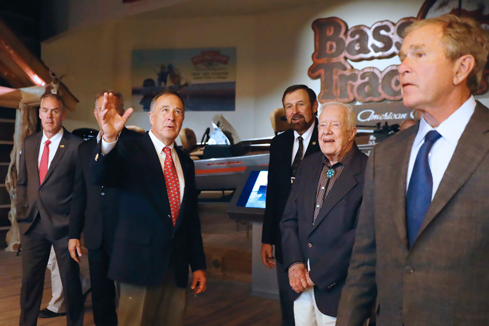 Rob Keck, third from right, in September 2017 helps lead a tour of WOW with Johnny Morris, center, for former Presidents George W. Bush and Jimmy Carter, at right.