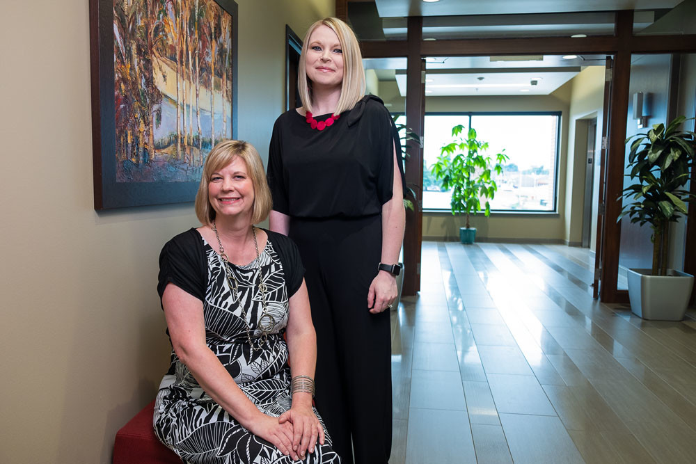 Barb Houser, left, and Crystal Mapp with KPM CPAs PC are among those who believe in the philanthropic spirit at the 52-year-old business.