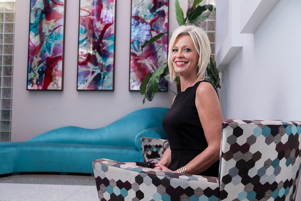 Missy Handyside, Oasis Hotel & Convention Center general manager, says the business stands out with its tropical theme and investment from ownership.