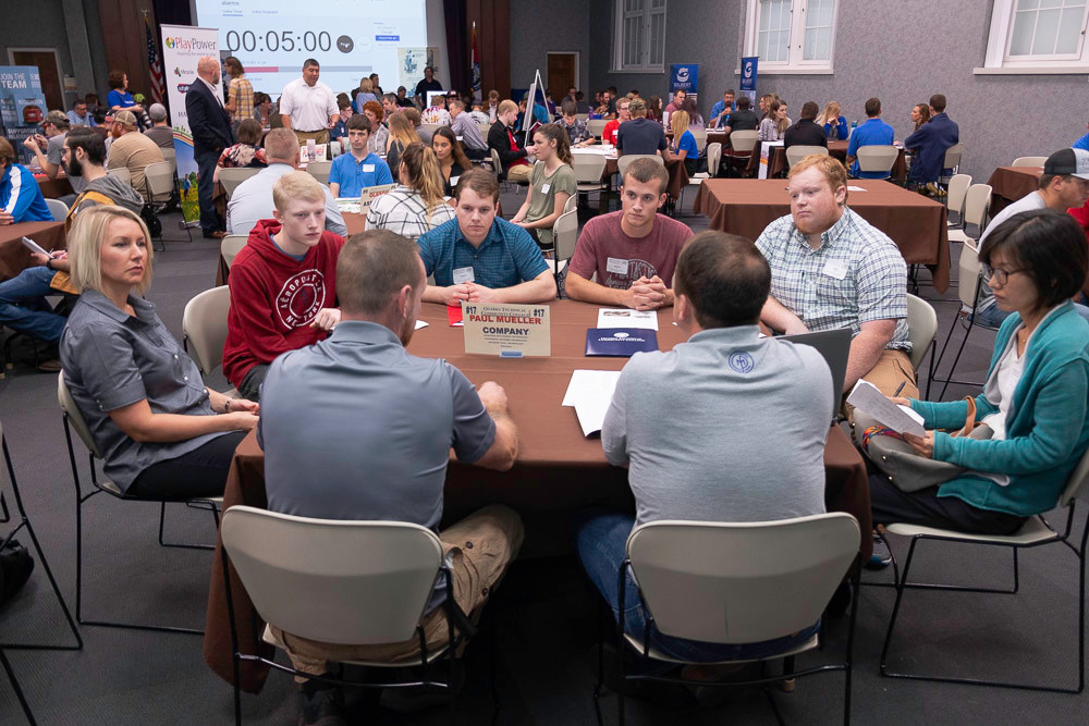 Ozarks Technical Community College students visit with Paul Mueller Co. representatives at an Oct. 4 speed dating-style jobs event.