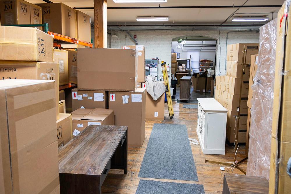 Boxes of furniture are stored, waiting to be unpacked as the weeklong store renovation continues.