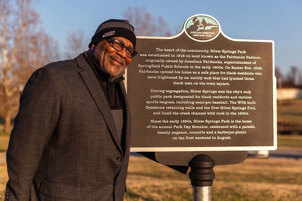 Big Momma’s Coffee CEO Lyle Foster stands by the first in a series of planned markers for a trail honoring Springfield’s African-American heritage.