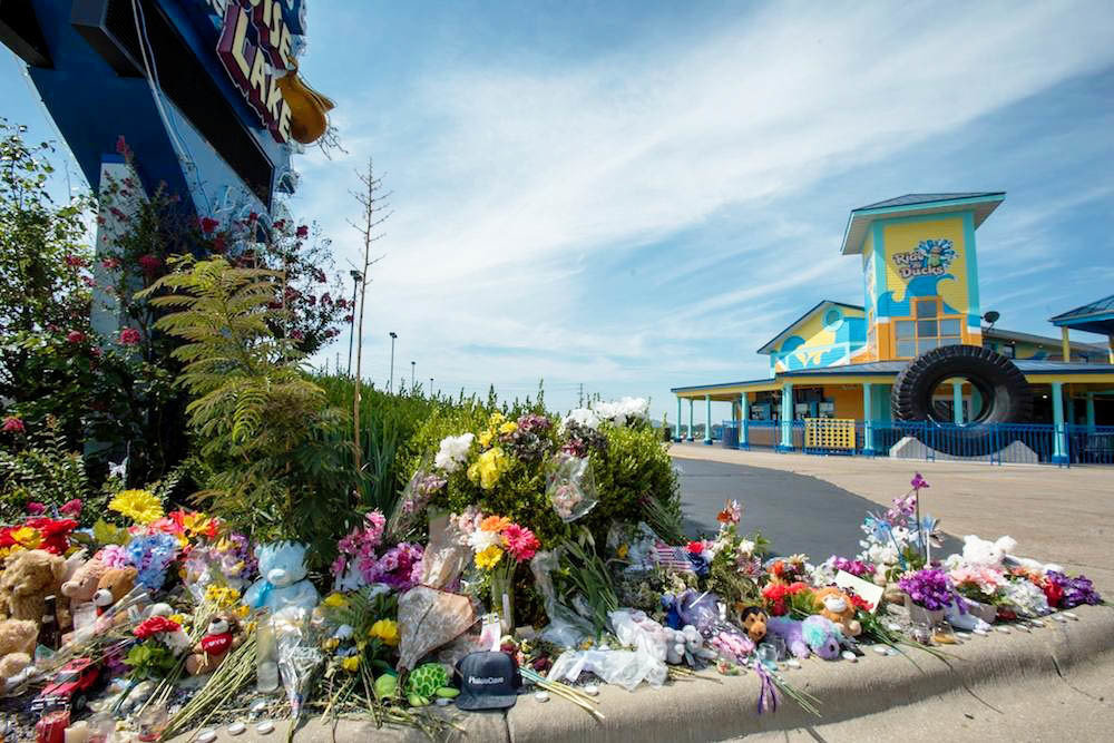 A memorial sits outside Ride the Ducks Branson in summer 2018. The depot has since been converted into a new attraction.
