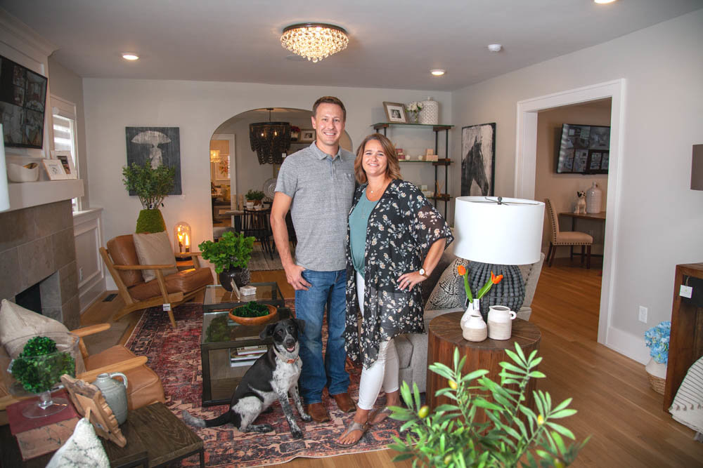 IN THE HOOD: Ellecor Design and Gifts, co-owner by husband and wife Brady and Haden Long, is settled into the Rountree neighborhood with their dog, Reign.