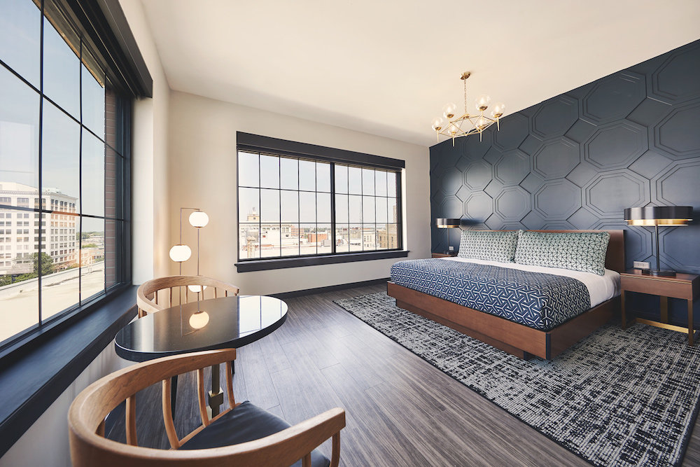 A king balcony suite with views of downtown is among the offerings at V2.