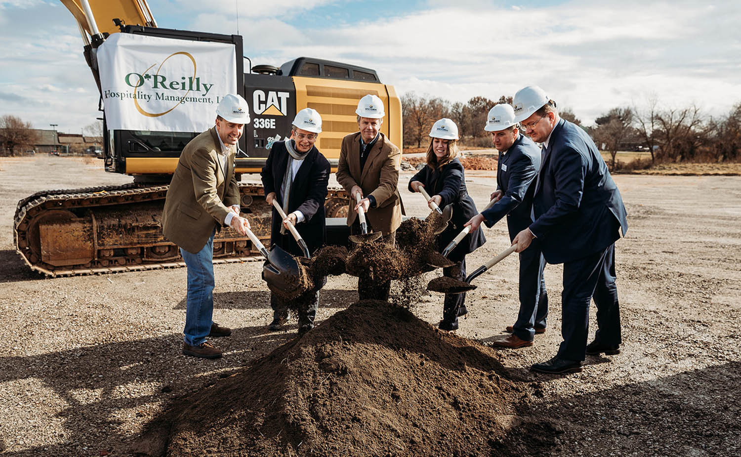 BIG GROUND TO COVER
Officials break ground Nov. 22 for O’Reilly Hospitality Management LLC’s BigShots Golf development near the corner of Kearney Street and Glenstone Avenue. Plans call for 56 driving bays on two stories, 3,500 square feet of meeting space, an outdoor putting green, golf academy for year-round training and a full restaurant. Pictured, left to right, are Donnie Volentine, operations manager with contractor Larry Snyder & Co.; Bill George, OHM project manager; Tim O’Reilly, OHM CEO and managing partner; state Rep. Crystal Quade; Matt Hudson of the North Springfield Betterment Association; and Bob Dixon, Greene County presiding commissioner.