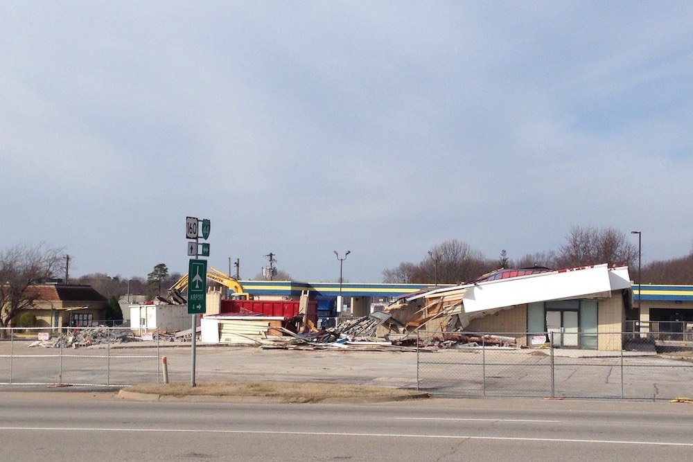 A former Kum & Go is shown undergoing demolition on Feb. 16. The building is being razed to make way for a Burger King.