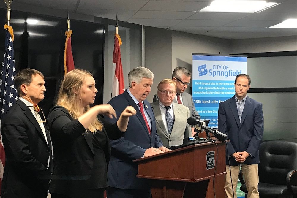 Public officials, including Gov. Mike Parson, gather Thursday to announce the first presumptive positive case of the coronavirus in Springfield.