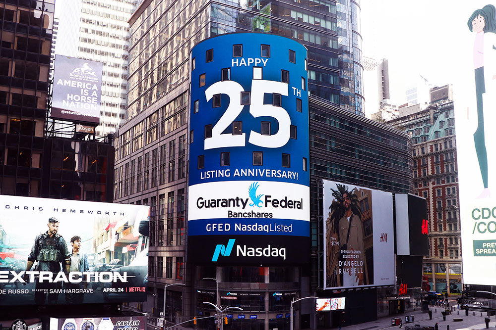 NASDAQ MILESTONE
A congratulatory message April 9 on Nasdaq’s seven-story LED tower in New York City’s Times Square celebrates Guaranty Federal Bancshares Inc.’s 25th anniversary on the stock exchange. The Springfield-based bank went public April 10, 1995. Nasdaq, founded in 1971, now has over 3,000 companies listed.