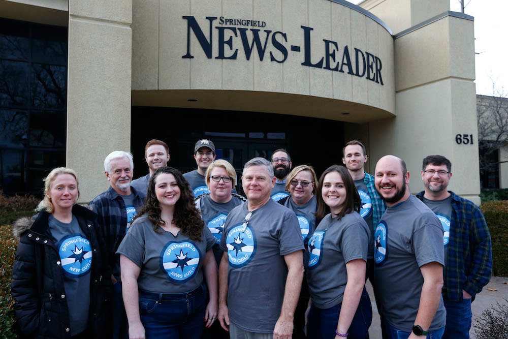 Nathan Papes, far right, front row, is one of two News-Leader workers whose employment was reinstated after Gannett Co. enacted layoffs.