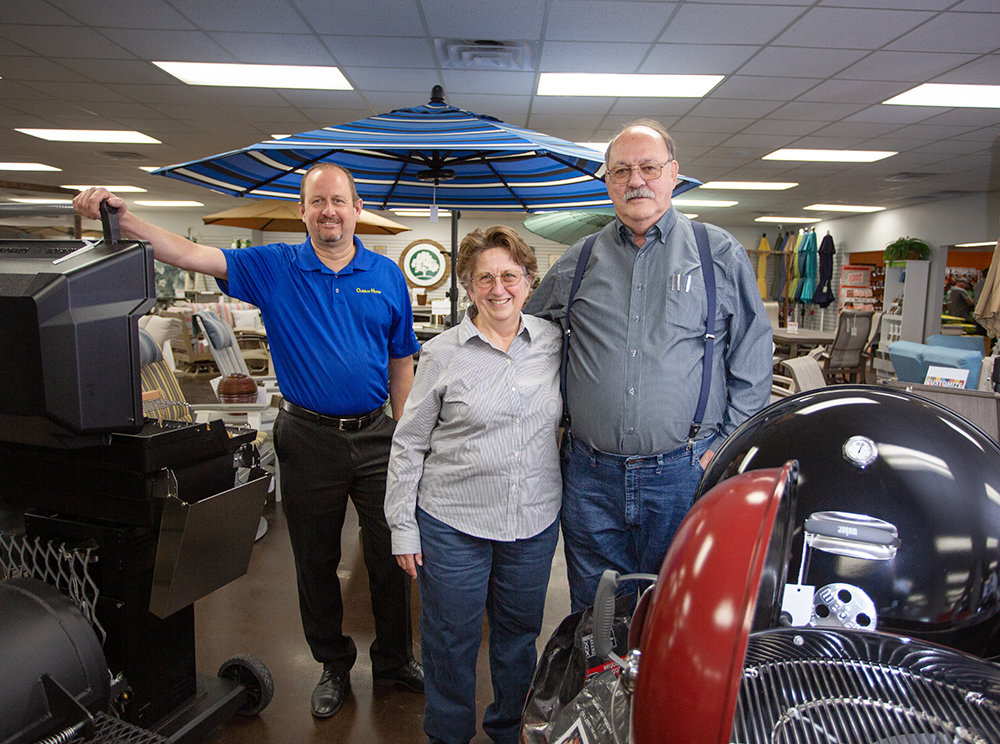 The coronavirus hasn't stopped business at Nixa-based Outdoor Home, as pickup and delivery options continue for the 25-year-old company. It's led by Kenny Minor, far left, Beverly Schmidt and husband, R.D.