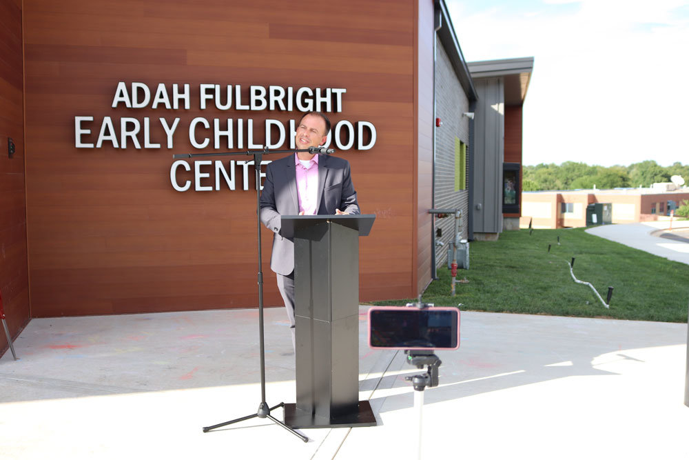 IN SESSION
Springfield Public Schools officials on Sept. 3 ceremonially cut the ribbon on the Adah Fulbright Early Childhood Center. The school is named after a longtime SPS teacher who graduated from the district in 1891. Superintendent John Jungmann, above, welcomes guests at the ceremony for the nearly $12.7 million project. It was funded as part of the $168 million bond issue dubbed Prop S.