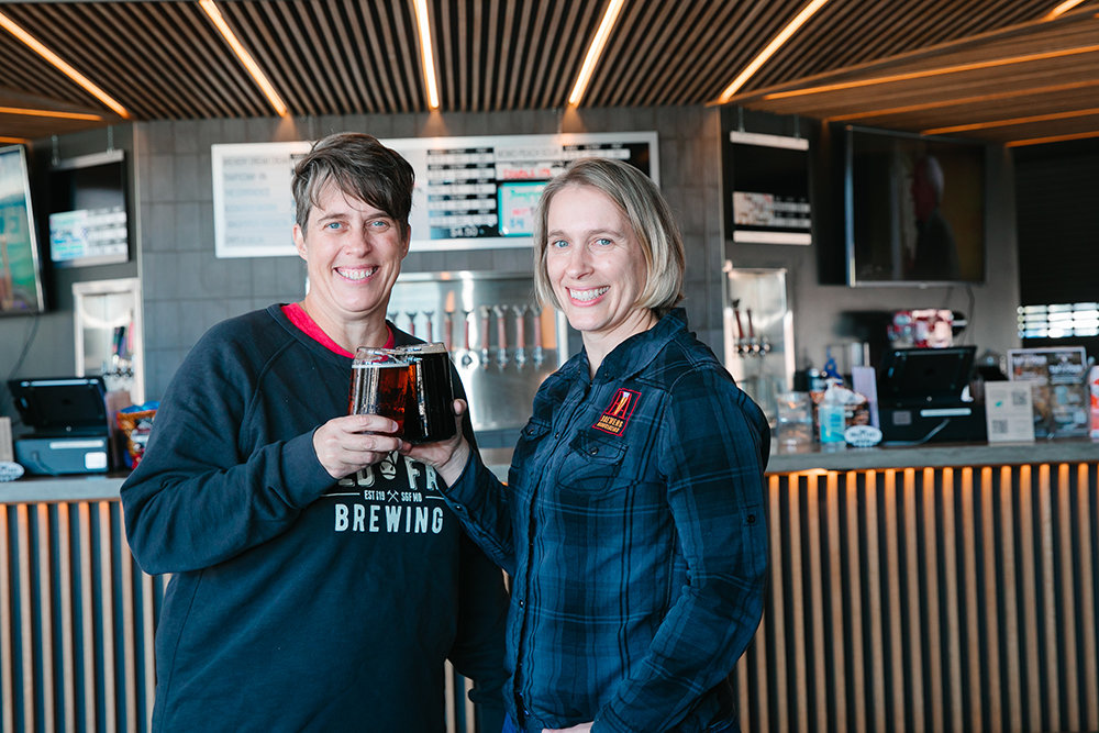FAMILY BREW: Sisters Carol, left, and Susan McLeod are in their second year of operation at Hold Fast Brewing in a former firehouse.