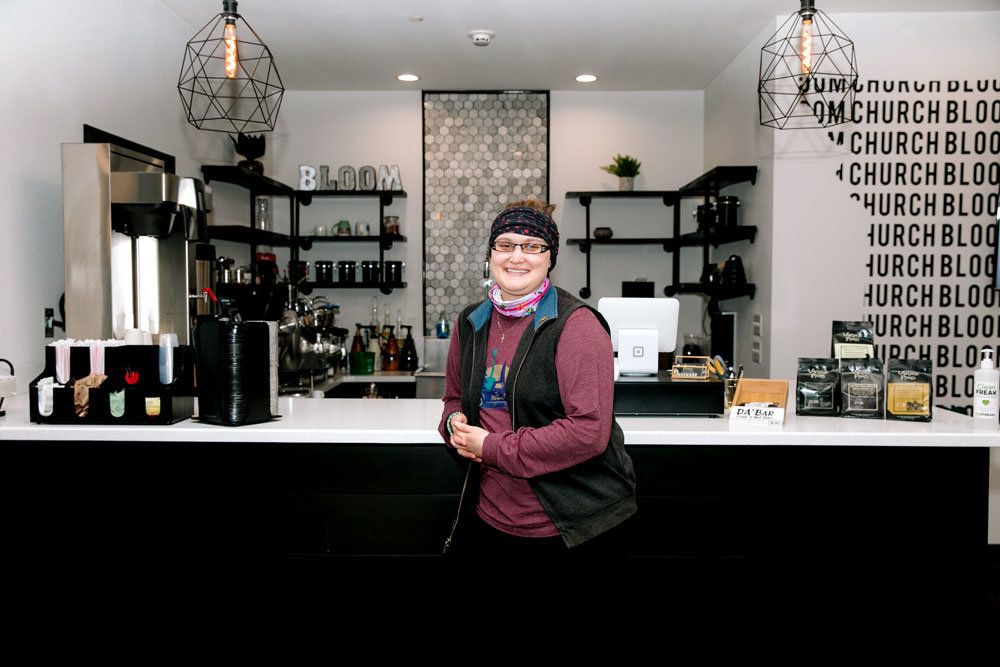VINTAGE COFFEE: Jessica Farmer runs day-to-day operations for Vintage Paris and the Collective Coffee Shop, where she's pictured inside Bloom Church in Branson.