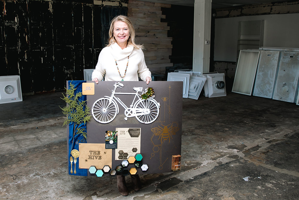 Melissa Skaggs holds a vision board used to inspire The Hive, an upcoming Willard cafe.