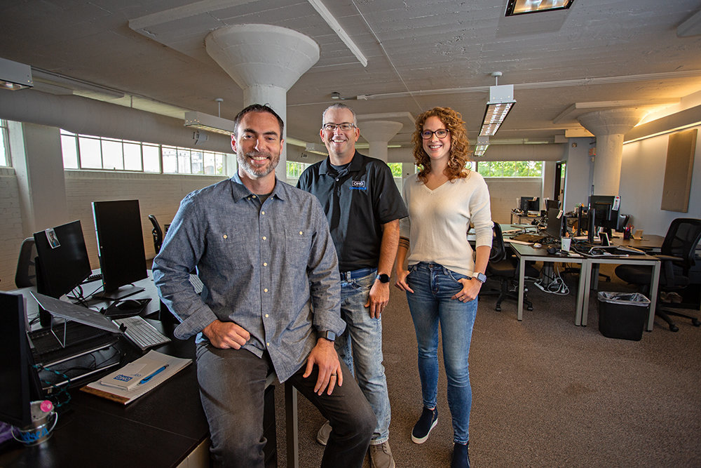 OMG Commerce ranks No. 74 on the list. The firm is represented above, from left, by Brett Curry, Chris Brewer and Sarah Edwards for SBJ's Economic Impact Awards last year.