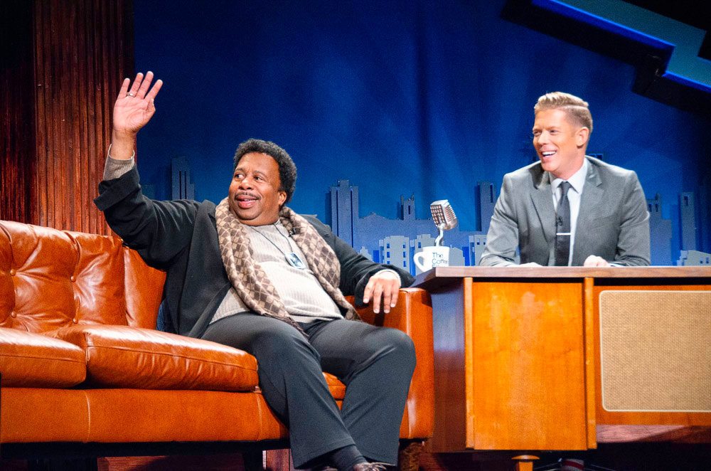 “The Mystery Hour” host Jeff Houghton, right, interviews actor Leslie David Baker of “The Office” fame during a live taping in 2019.