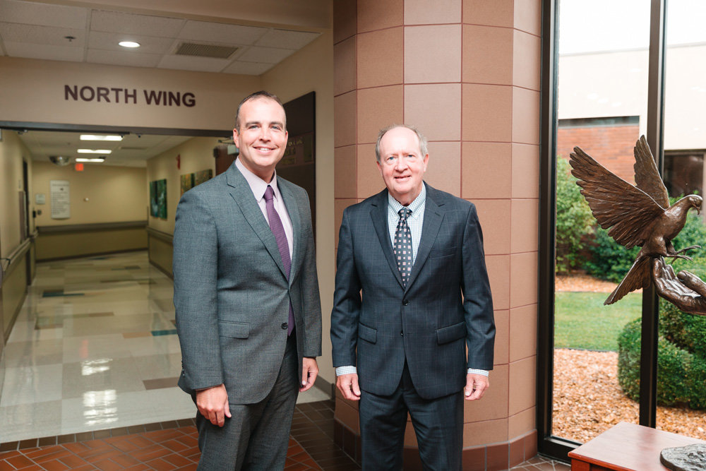 THE HANDOFF: Citizens Memorial Hospital Chief Operating Officer Michael Calhoun, left, is set to inherit the CEO role from Gary Fulbright, who is retiring Dec. 31.