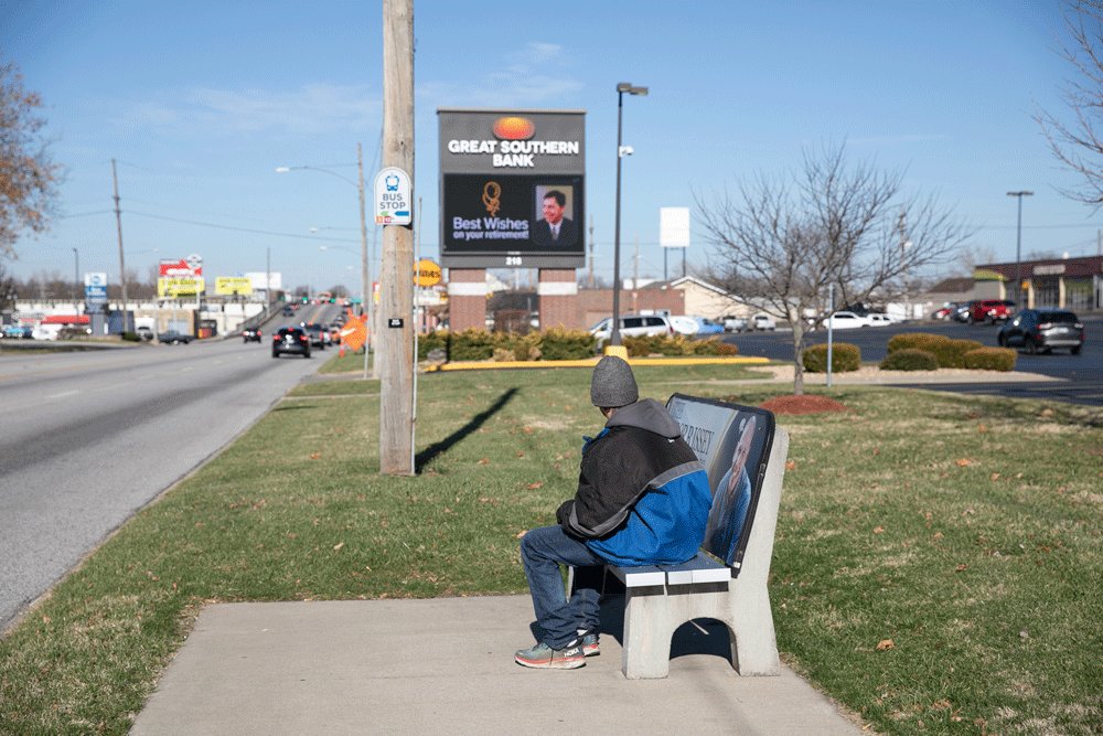 A sidewalk leads to this Glenstone Avenue bus stop from the south, but it doesn't continue north. A proposed city-state partnership would improve accessibility.