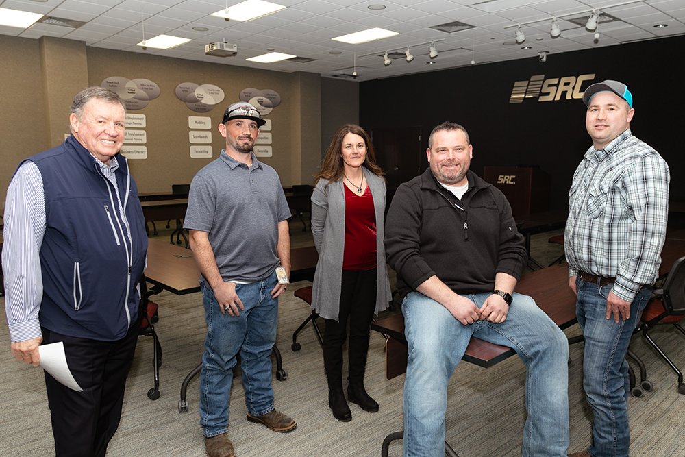 SRC Holdings founder Jack Stack, far left, says he learns by listening to employee owners Ty Teague, Krisi Schell, Eric Coulter and Leland Dull.
