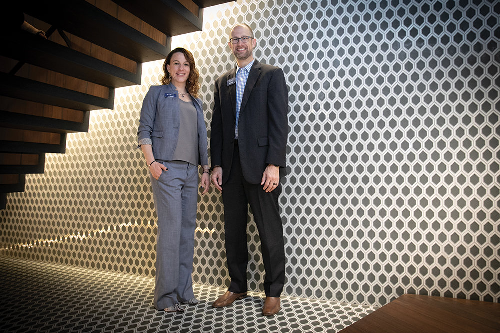 Andrea Sitzes and Ryan Mooney are two keys to Arvest Bank's strategy to weave economic development skills into commercial loan services.
