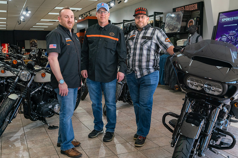 From left, Dominick Cricchio, manager of the apparel licensing department; Ty Harris, general manager; and Chad Anderson, vice president of operations, lead the Renegade Harley-Davidson team.