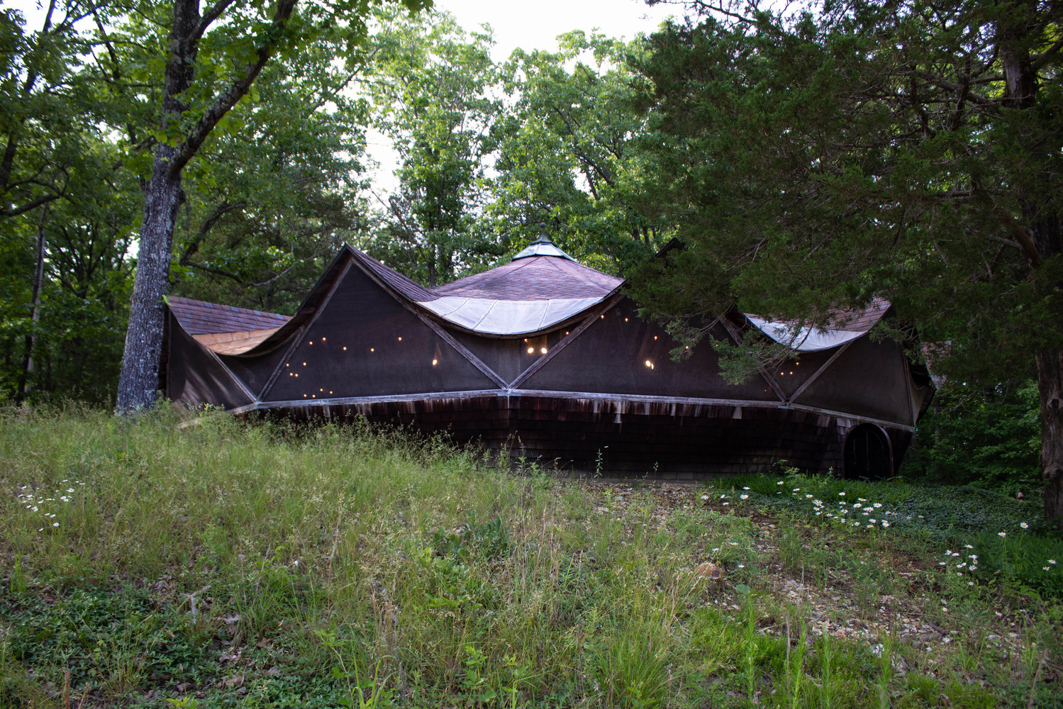 The Forest Garden Yurts event space, visible from the highway, is the right venue for certain super-chill couples.