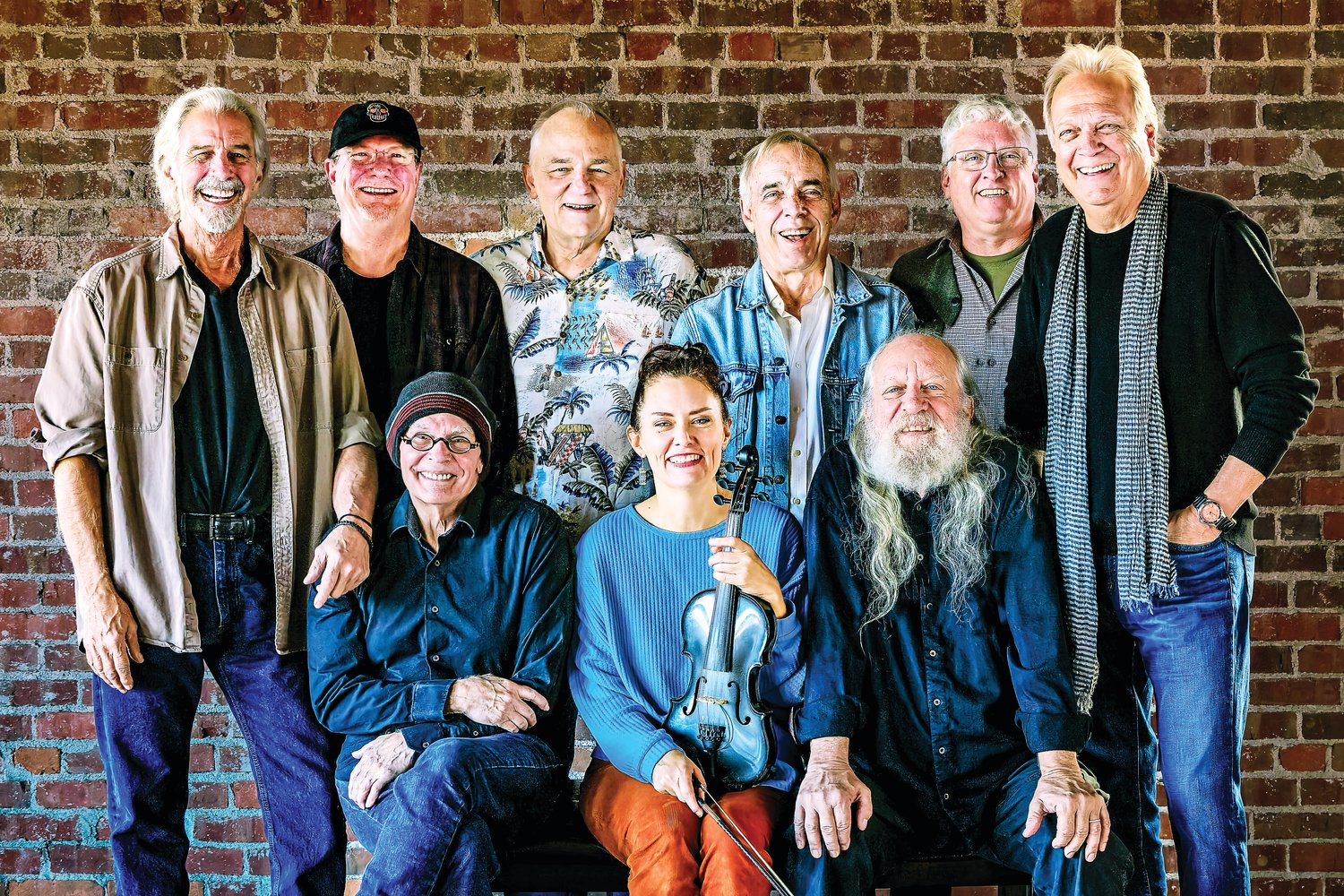 The current incarnation of The Ozark Mountain Daredevils includes (from left, front) Ruell Chappell, Molly Healey, Supe Granda, (back) Ron Gremp, Dave Painter, Bill Jones, Nick Sibley, Kelly Brown and John Dillon.