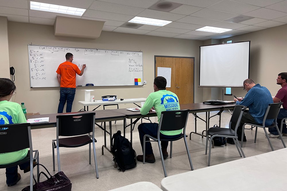 CLASSROOM INSTRUCTION: Cameron Seip of General Laborers Local 663 instructs Missouri Apprentice Ready participants on math needed for job site construction work.