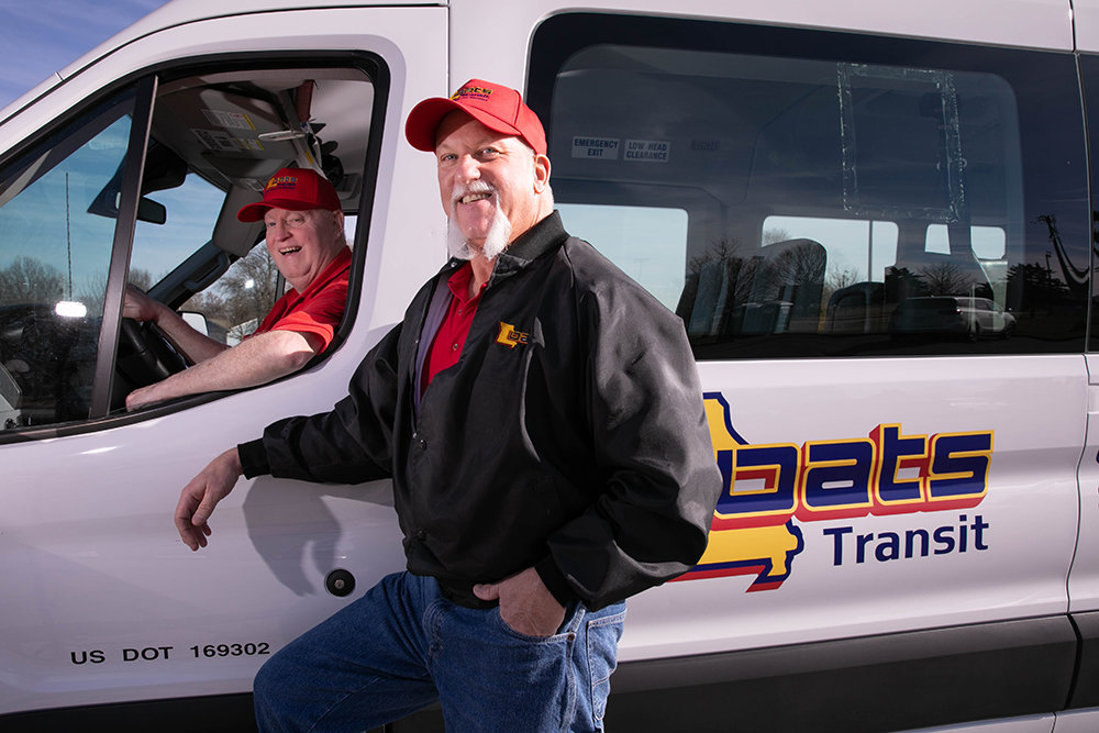 Craig MacDonald, left, and Bob Whitney are on the team of some 75 drivers for OATS Transit in southwest Missouri.