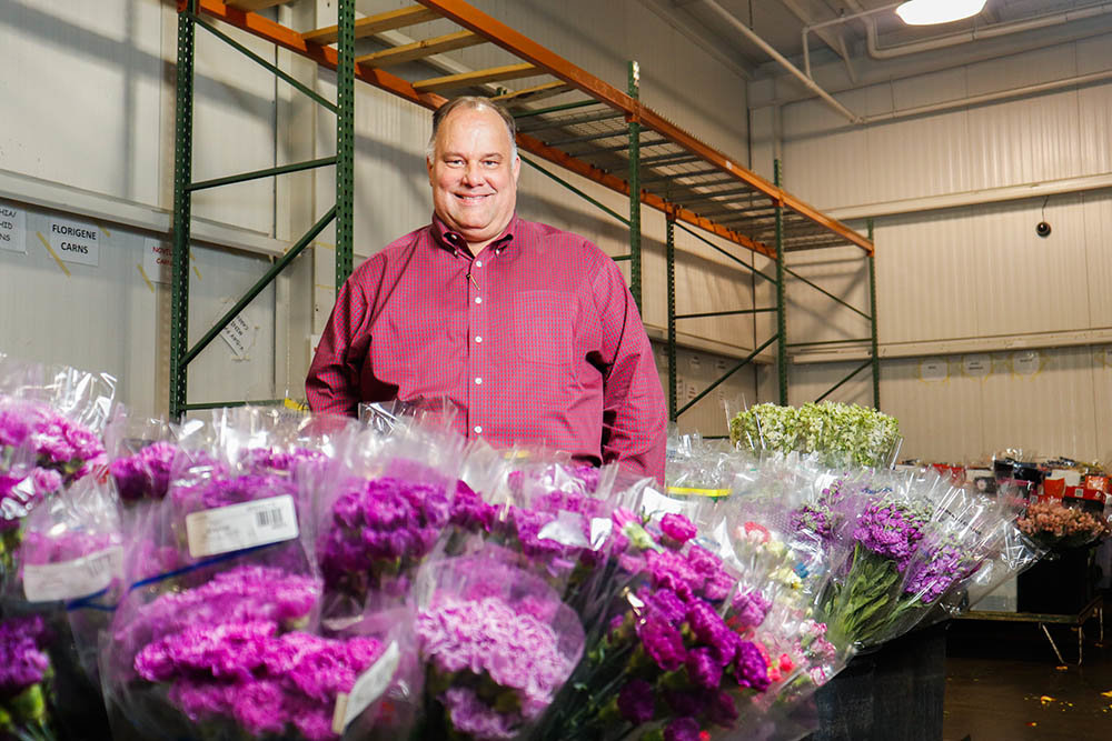 Richard Stone, president of Mears Floral Products, says his warehouse carries some 150 varieties of flowers.