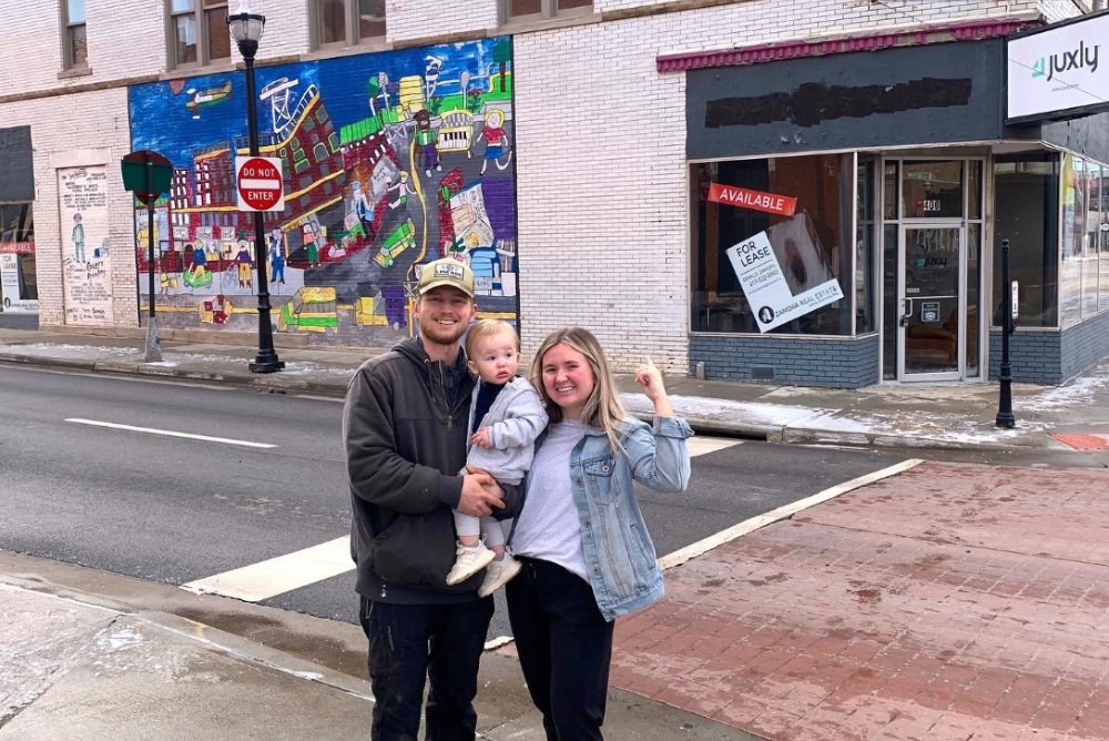 Garrett and Rose Cochran, holding their son, Clark, are leasing space at 400 W. Walnut St.
