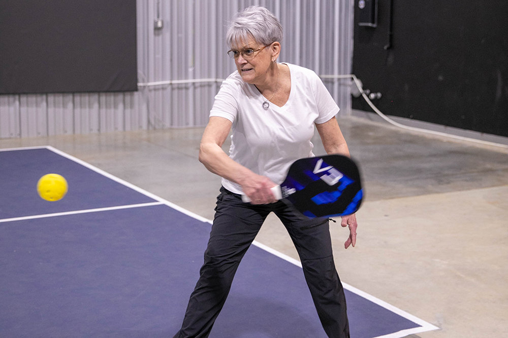 Jayne Browne plays pickleball at Classic's Yard, which opened last month.